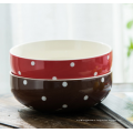 Glazed porcelain salad bowl with dots.